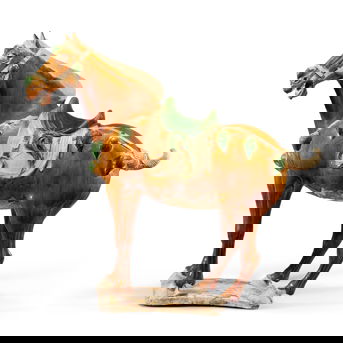 A Massive Sancai-Glazed Pottery Figure of a Caparisoned Ferghana Horse