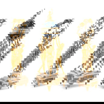 A Louis XVI Style Gilt-Bronze and White Marble Annular Clock Garniture