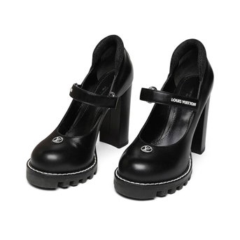 A Pair of Louis Vuitton Black Calfskin Star Trail Ankle Pumps