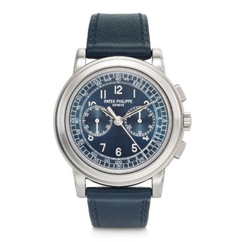 Patek Philippe. A Very Rare, Large, and Elegant Platinum Chronograph Wristwatch With Blue Cloud Dial