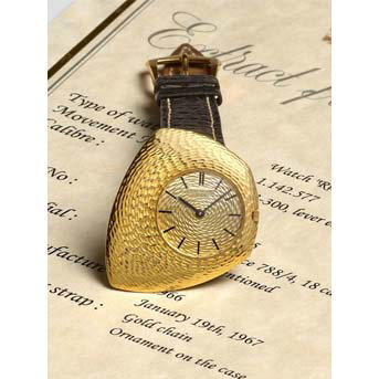 Patek Philippe. A Fine 18k Gold Asymmetrical Manual Wind Wristwatch