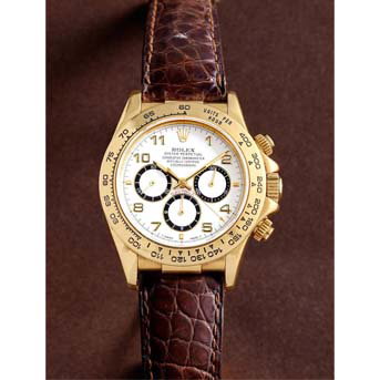 Rolex. An 18k Gold Automatic Chronograph Wristwatch