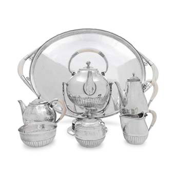 A Georg Jensen Cosmos Seven-Piece Silver Tea and Coffee Service