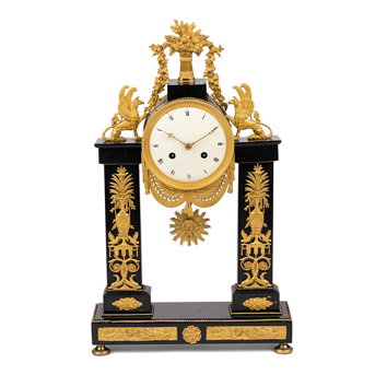 An Empire Patinated and Gilt Bronze Mantel Clock
